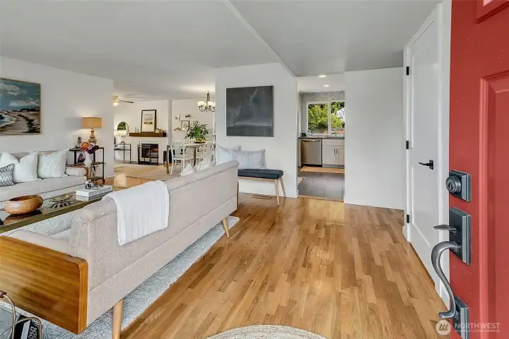 Original oak hardwood floors throughout the main living area.