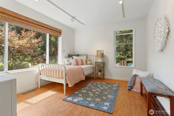 Top floor second bedroom is ideal as a gracious guest room or a refined work-from-home office.  Sunny southern exposure!