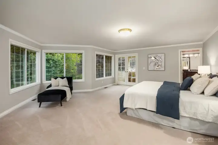 Upstairs, you’ll find a sumptuous primary retreat with a private outdoor sitting area to enjoy your fist cup of coffee or watch the sunrise.