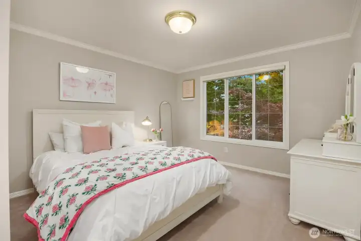 Bedroom number two on the upper level has it's own 3/4 bath ensuite.