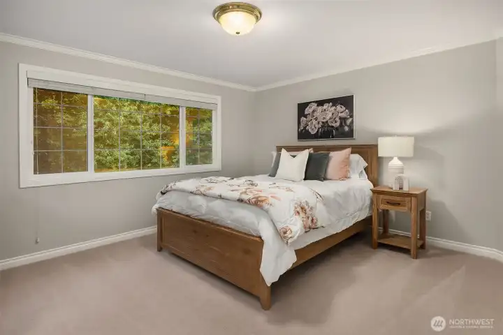 Upper level bedroom number three connects to a dual access, full size bathroom.
