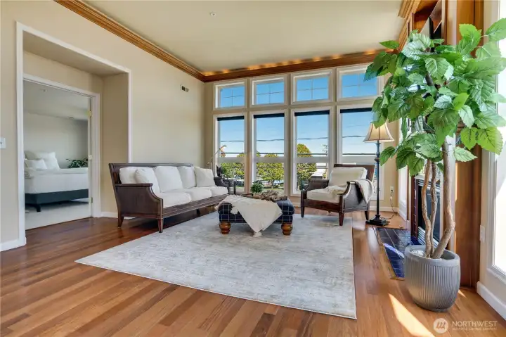 The entry to the primary suite is tucked just off the living room. Let’s take a look!