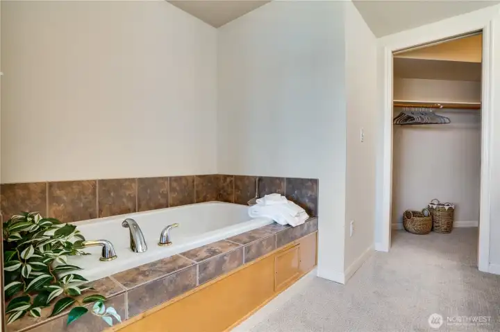 Treat yourself to a soak in the jetted tub—an everyday luxury with a view.