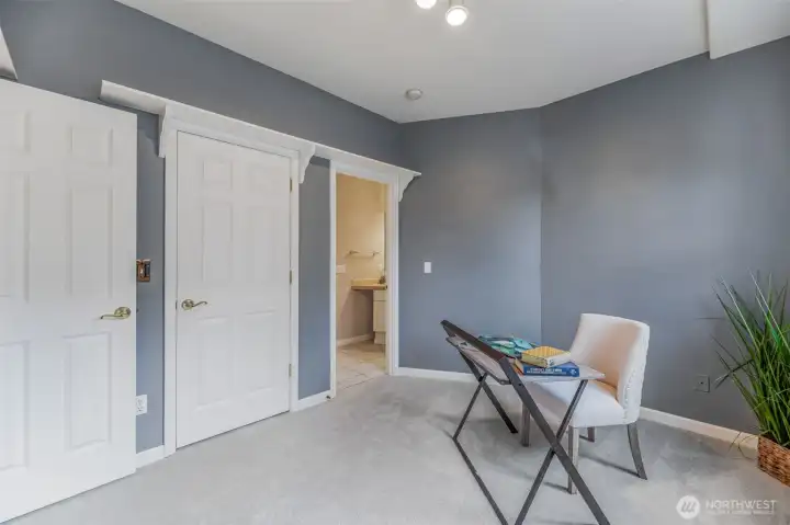 Ground floor bedroom, staged as office. Attached 3/4 bath, perfect for home office or long-term guests