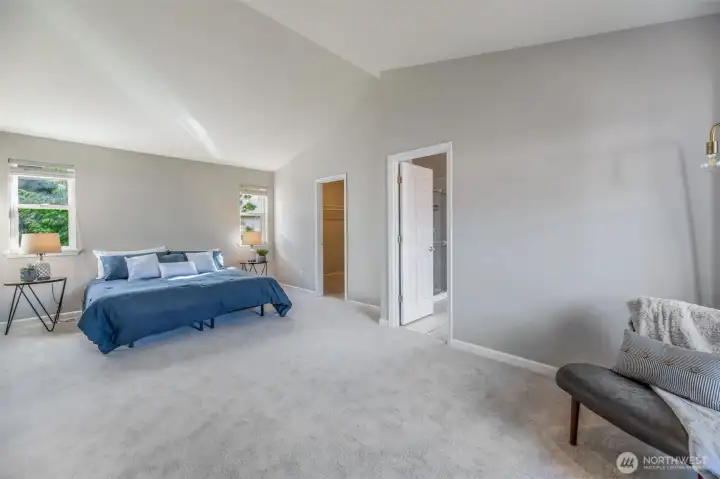 At the top of the stairs you will find the oversized primary suite, with sitting area