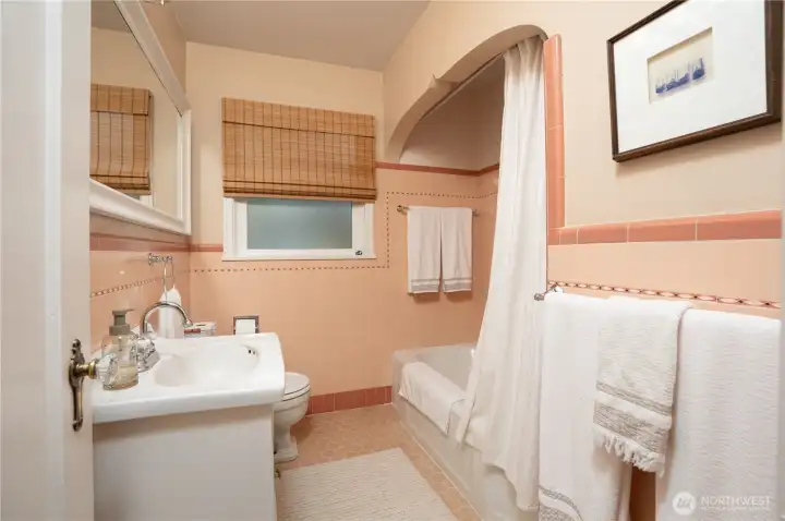 Loving the charm and character of this main floor full bathroom.