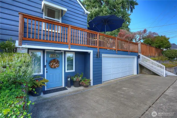 The private, lower level entrance opens to a fully functioning 950 square foot lower unit, which has a sleep suite,  living room, 3/4 bath, dining room, and kitchen.  This space has been operating as a beloved Airbnb since 2014 and has a fantastic clientele as the owner is a "Super Host."  Been thinking about extra income?  It's a producer.  Want more space for guests or maybe you want to turn this into your own primary suite?  Well, you can also access it from inside. Thinking long term rental?  No need to build the increasingly popular A.D.U.- you have a fantastic one right here.  Let's head inside.
