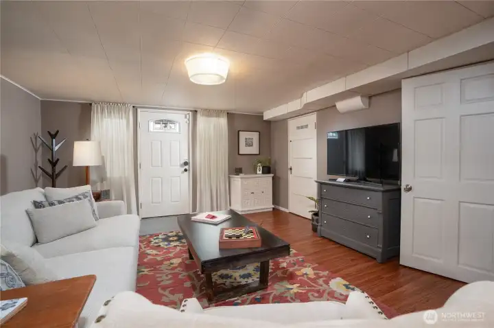 Welcome to the lower level.  With its own private entrance, your guests- be they relatives, friends, long term tenants, or short term Airbnbers, don't need you to be home in order to get in.