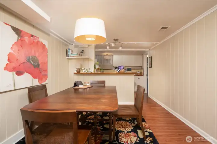 The downstairs unit has its own dining space and kitchen.