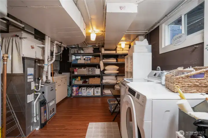 The utility room is large and efficient and full of storage (not pictured is an entire wall of built in cabinets.)  Never underestimate good storage- it's a good thing.
