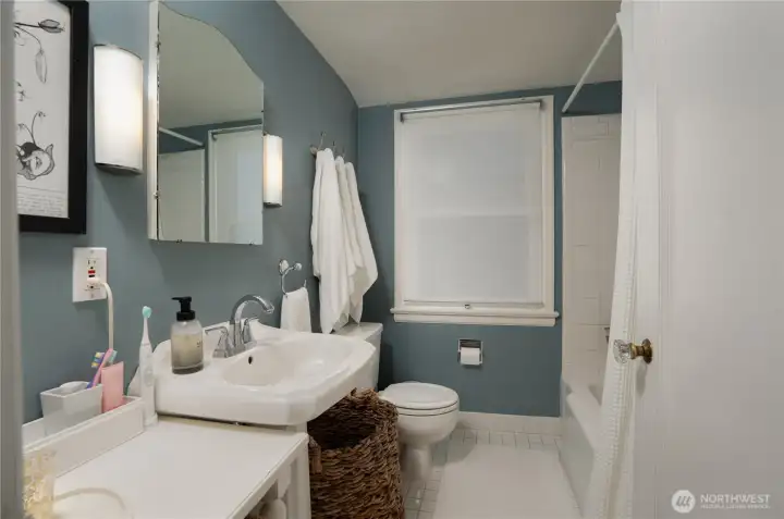 Also on the second floor, you will find another full bathroom, centrally located between bedrooms.