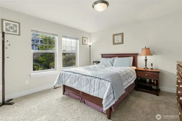 Bedroom #2 with high ceilings faces south