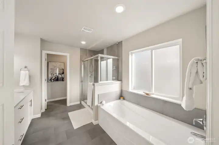 Primary bath with oversized long soaking tub