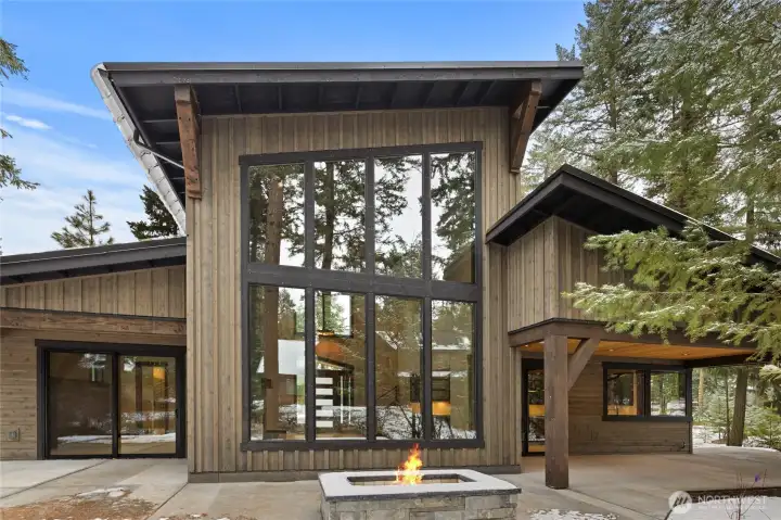 Back of home view with gas firepit