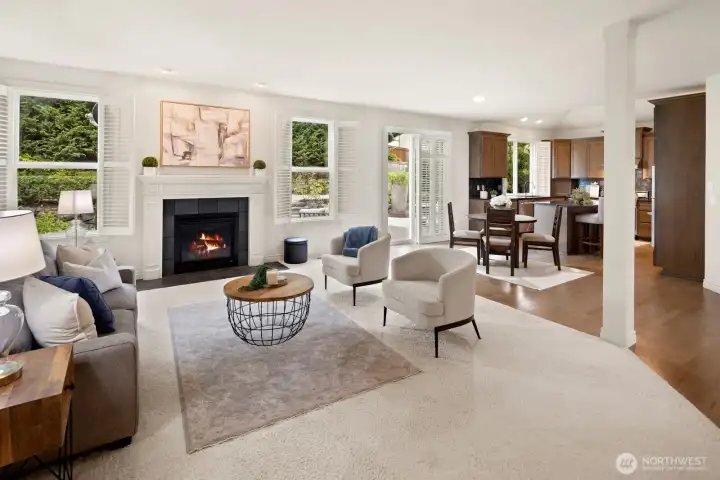 Cozy gas fireplace is perfect for cool evenings.  Plantation shutters throughout this magnificent home!