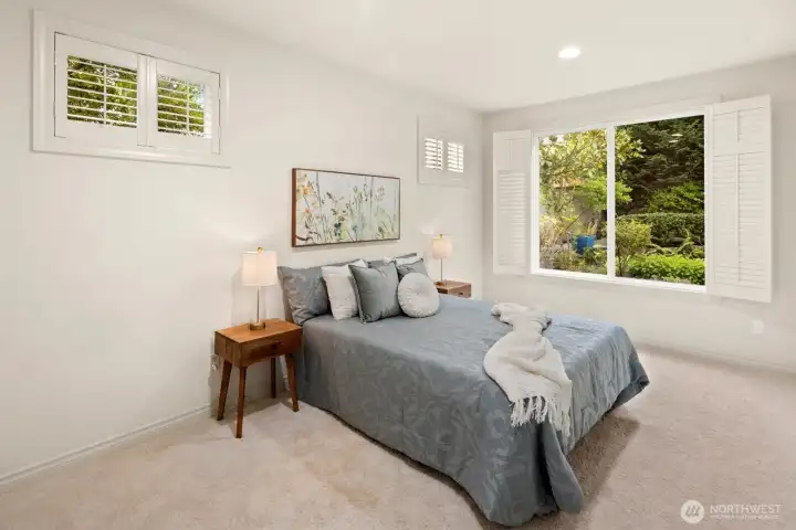 Spacious main floor bedroom with closet is perfect for guests or those not wanting to use stairs.   Could also be a main floor office!
