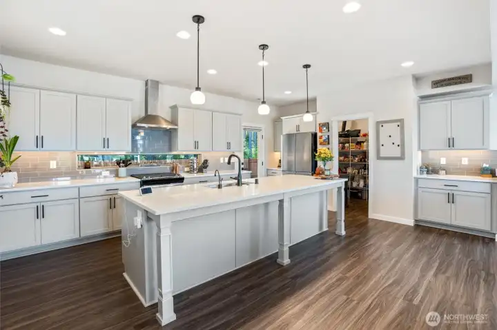 Coffee nook, pendant lighting over island.