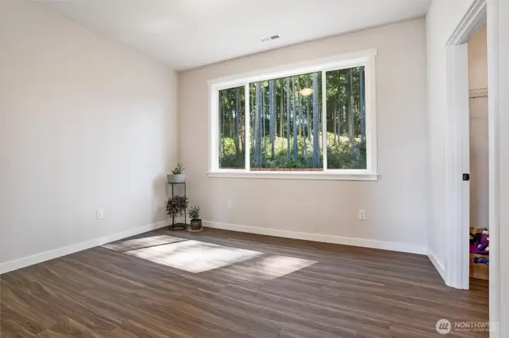 Den or 5th bedroom with walk in closet.
