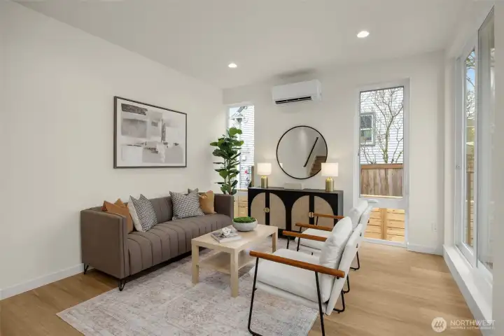 Kitchen opens to living and dining areas.