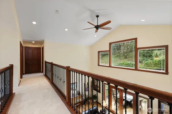 Upstairs landing: each side features 2 rooms and a full bath. It is the perfect layout!