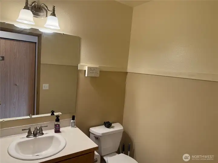 Powder Room (1/2 Bath) Conveniently located in the Hall near the Main Entry and off the Kitchen and Family Room Areas.