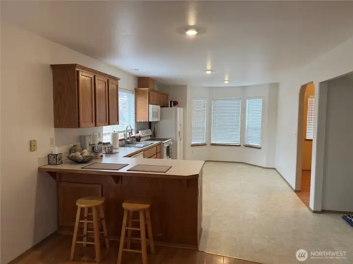 Nice Big Kitchen with Eating Nook and Breakfast Counter. Plenty of Cabinets and Storage. All Appliances Stay with the Home.