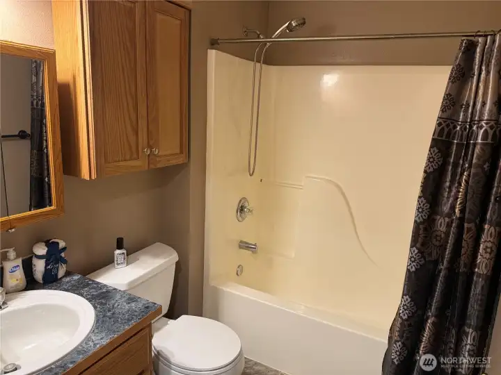 Upstairs Full Guest Bath conveniently located in the hall near the Guest Bedrooms.