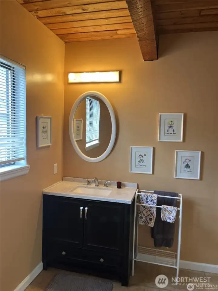 Half bath on the main floor complete with a shower.