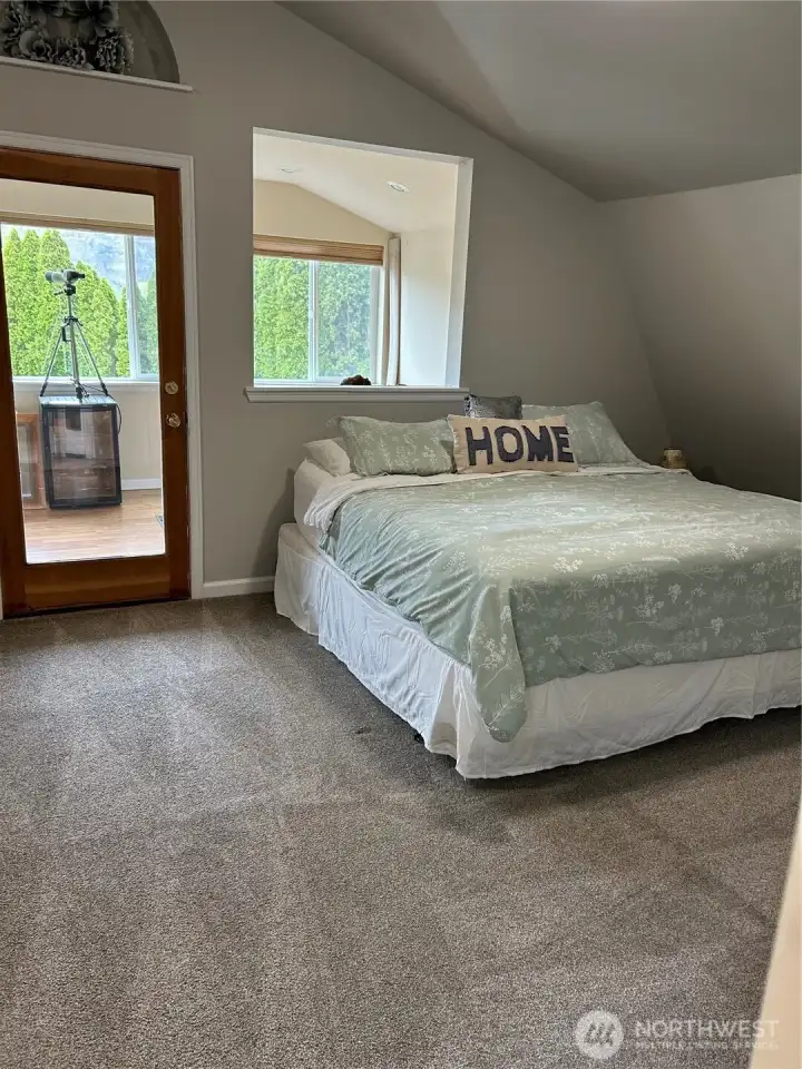 This is the main bedroom with attached large office or den.