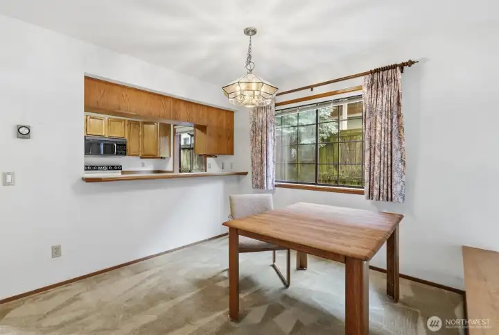 Dining area with additional bar seating.