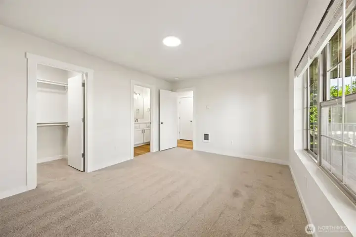 Main level Primary Suite with full bath and walk in closet