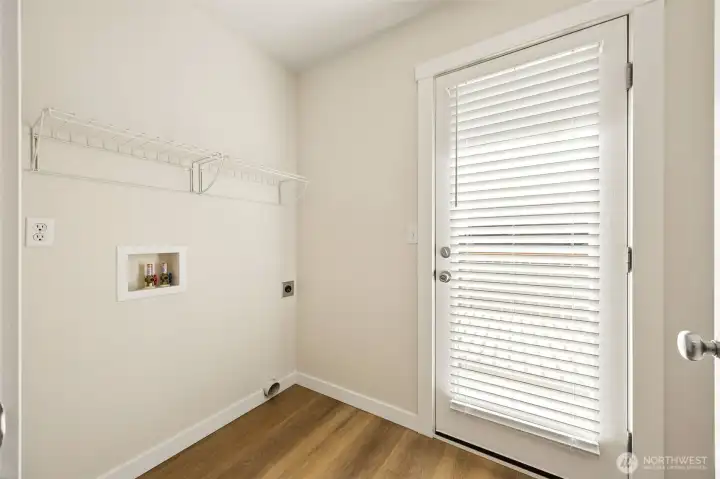 Utility room with access to yard