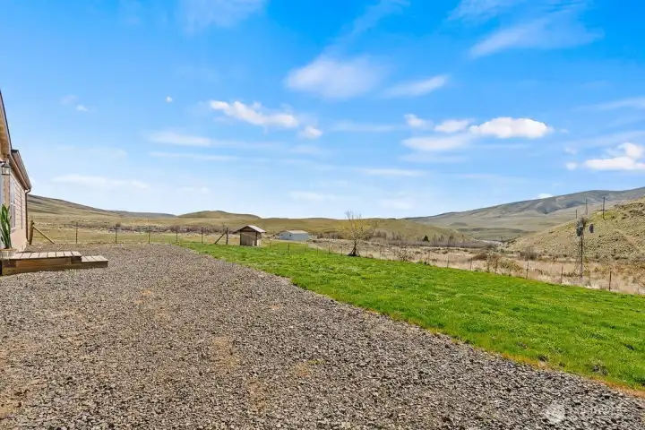 Expansive yard space offers room to roam, entertain, or create your own outdoor retreat, all surrounded by wide open countryside.