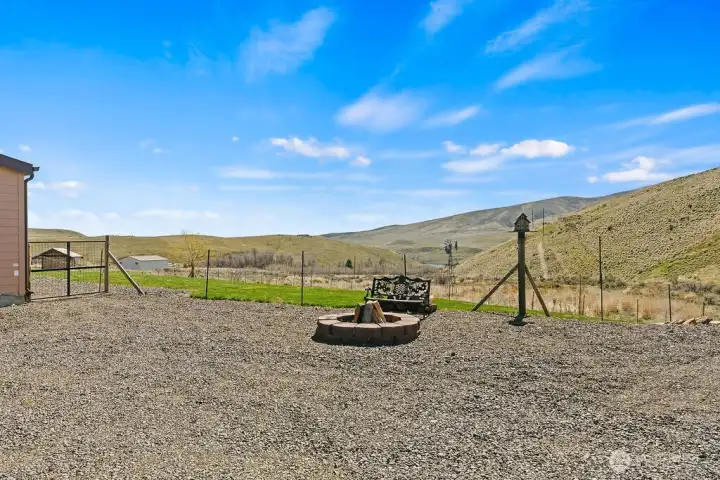 Dedicated fire pit area creates a natural gathering space to enjoy evenings under the stars and take in the peaceful Wenas Valley surroundings.