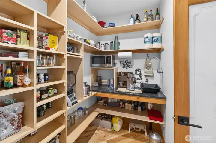 Walk-in pantry w/plumbed coffee bar Walk-in pantry w/plumbed coffee bar