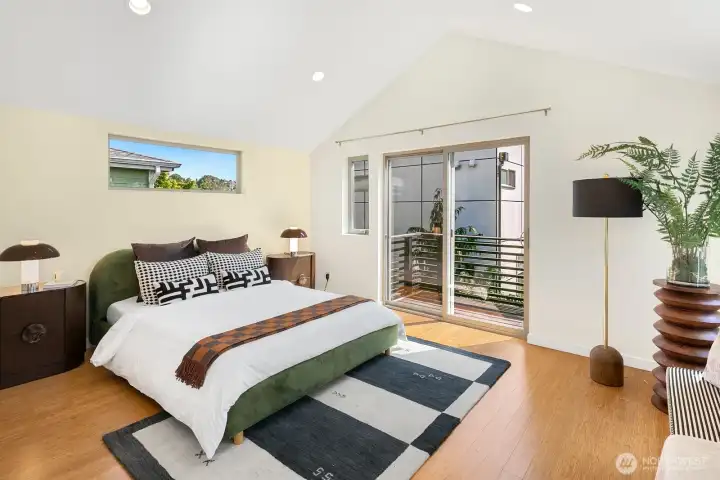 A serene primary suite with vaulted ceilings, generous proportions, and a calming sense of space.