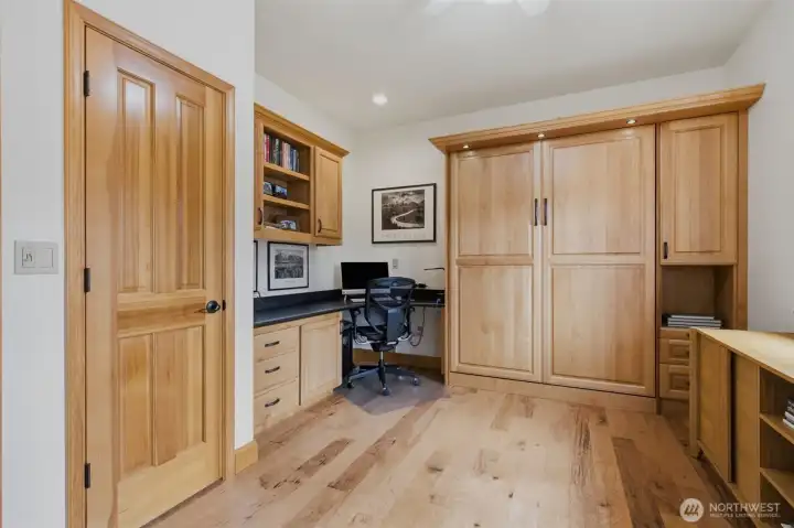 Office with built-in desk and Murphy Bed