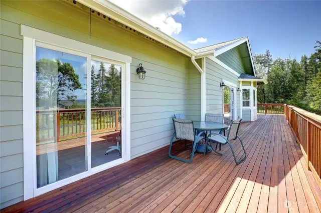 Plenty of room for entertaining, enjoy the afternoon sunshine looking out at the mountains