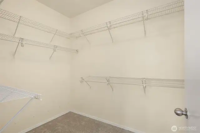 Super large walk-in closet in the primary bedroom.