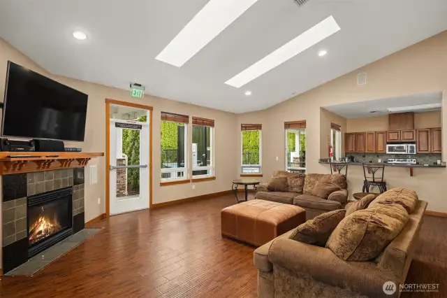 The clubhouse entertainment room with a full kitchen