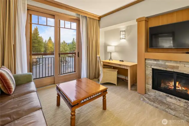 Cozy up to the fireplace on the cooler summer mornings.