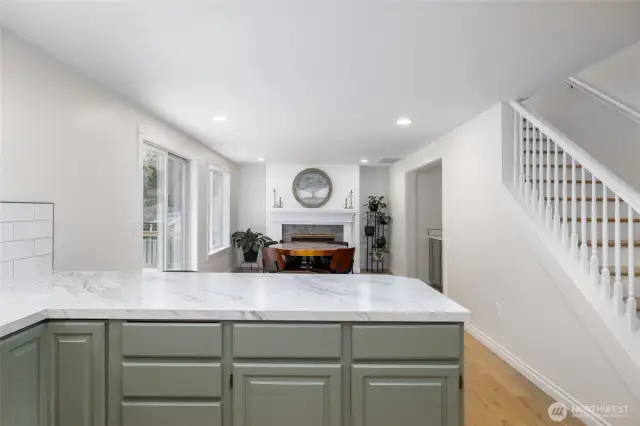 standing in the kitchen, looking into flex space #2 - dining room?  sitting room?