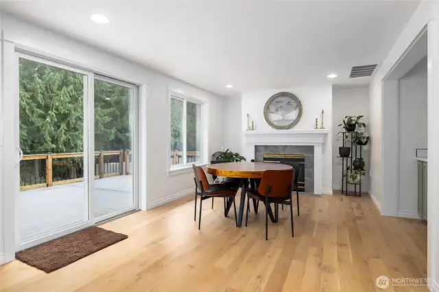 Fireplace #2 in this room, and the slider to the back deck.  Plus look at all those windows and natural light!