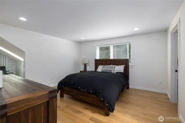 Moving upstairs, the primary suite