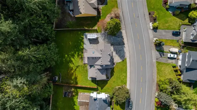 aerial view of the home and E. Broadway.  A neighborhood of well-maintained and attractive homes!