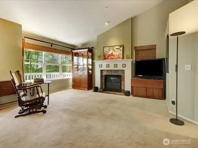 Living room with gas fireplace and westerly views