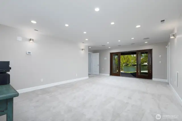 Media Room W/ Doors to Patio and Lake