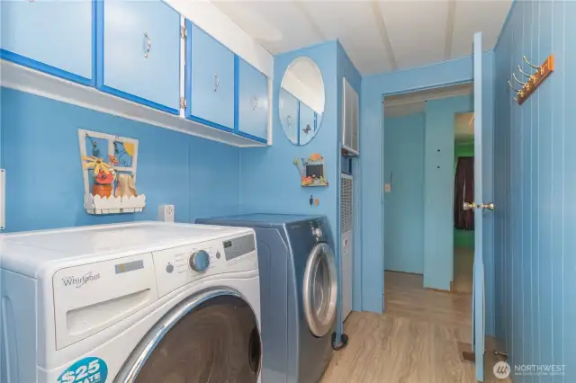 Large laundry room with outside access