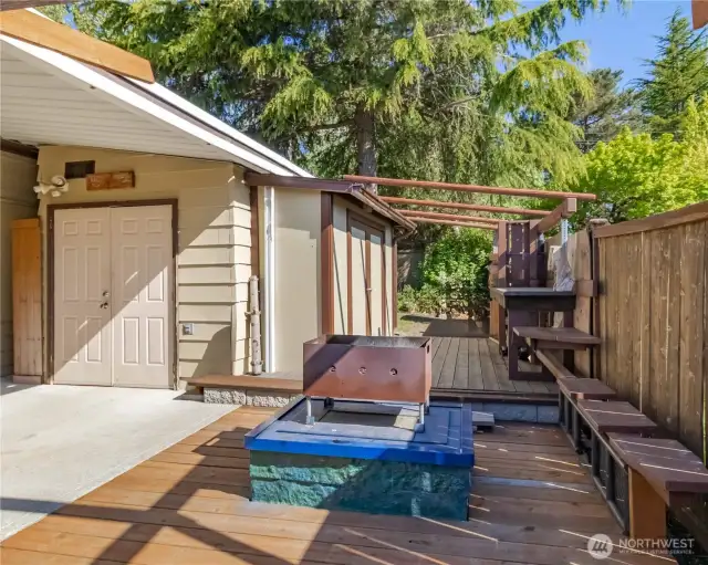 Outdoor living space with a custom firepit