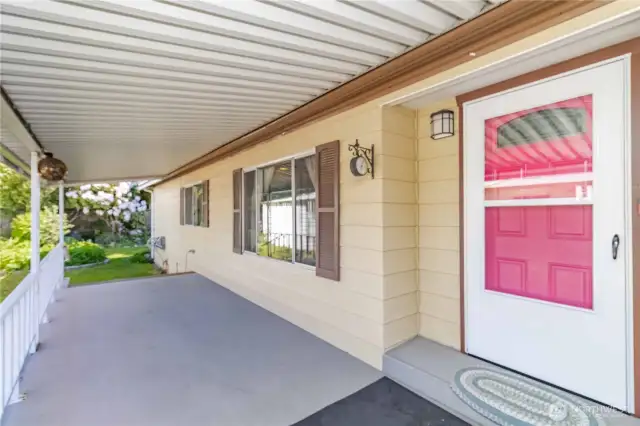 Front covered porch leading to your back yard oasis
